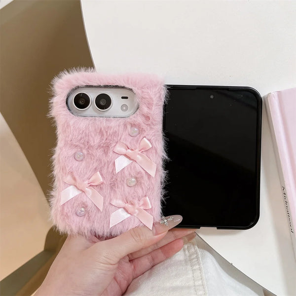 Close-up of soft fur texture and bow details on case