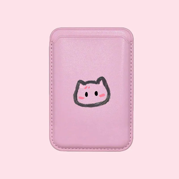 Pink cartoon cat design on pink wallet holder on pastel backdrop