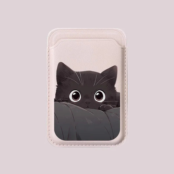 Cat peeking from under blanket on card holder design
