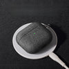 Close-up of cloth grain fabric texture on AirPods case