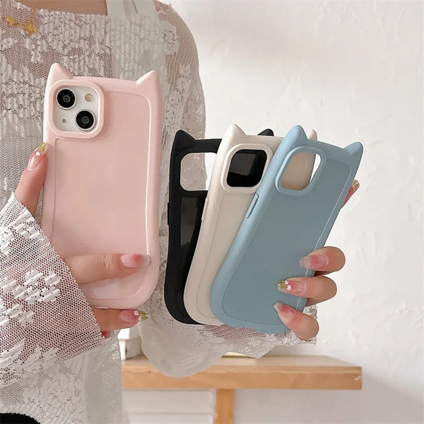 Beige cat-ear silicone case on iPhone 13 Pro
