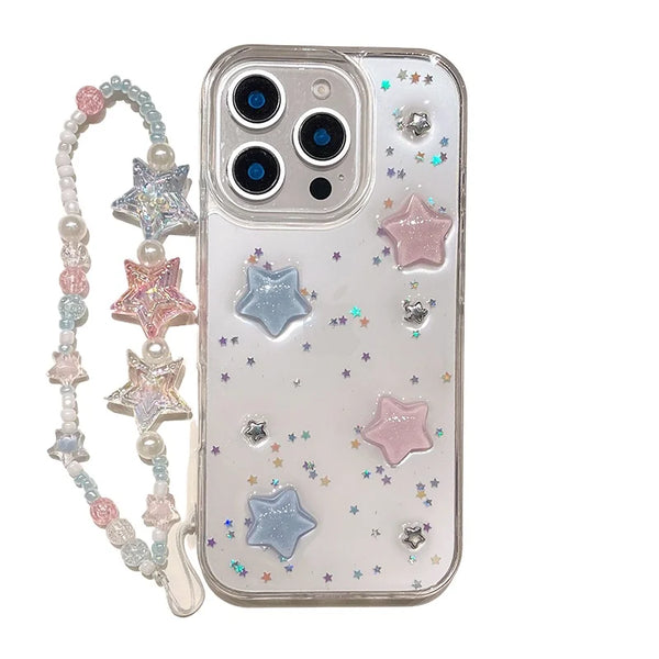 iPhone 16 with star glitter case and accessory chain.
