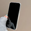Clear iPhone case with pastel stars and glitter pieces.