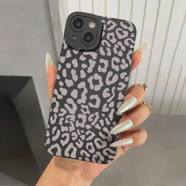 Black leopard print case with matte texture held in hand