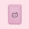 Pink cartoon cat design on pink wallet holder on pastel backdrop