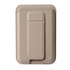 MagSafe Leather Stand Wallet on pink surface showing stand in use